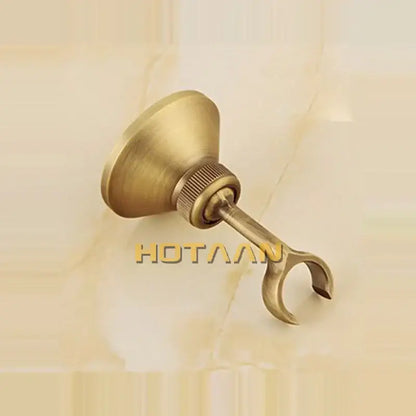 Antique brass bidet with floral ceramic knobs for bathroom