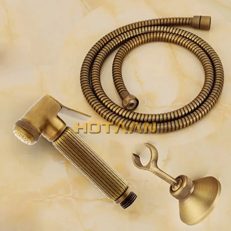 Antique brass bidet with floral ceramic knobs for bathroom