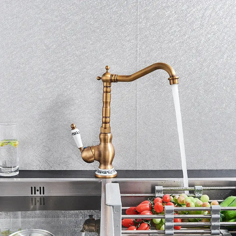 Antique brass ceramic handle kitchen basin faucet with blue floral detail