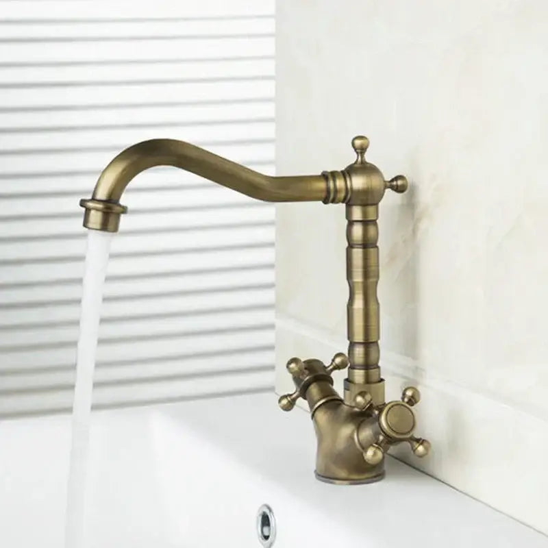 Antique brass dual handle kitchen faucet with swivel spout