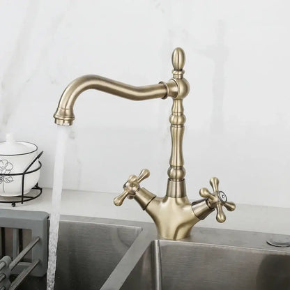Antique brass dual handle kitchen faucet with swivel spout