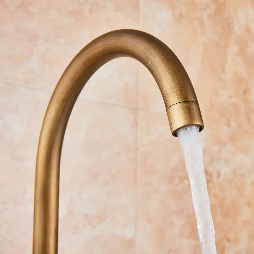 Antique brass swivel spout mixer tap bathroom freestanding faucet