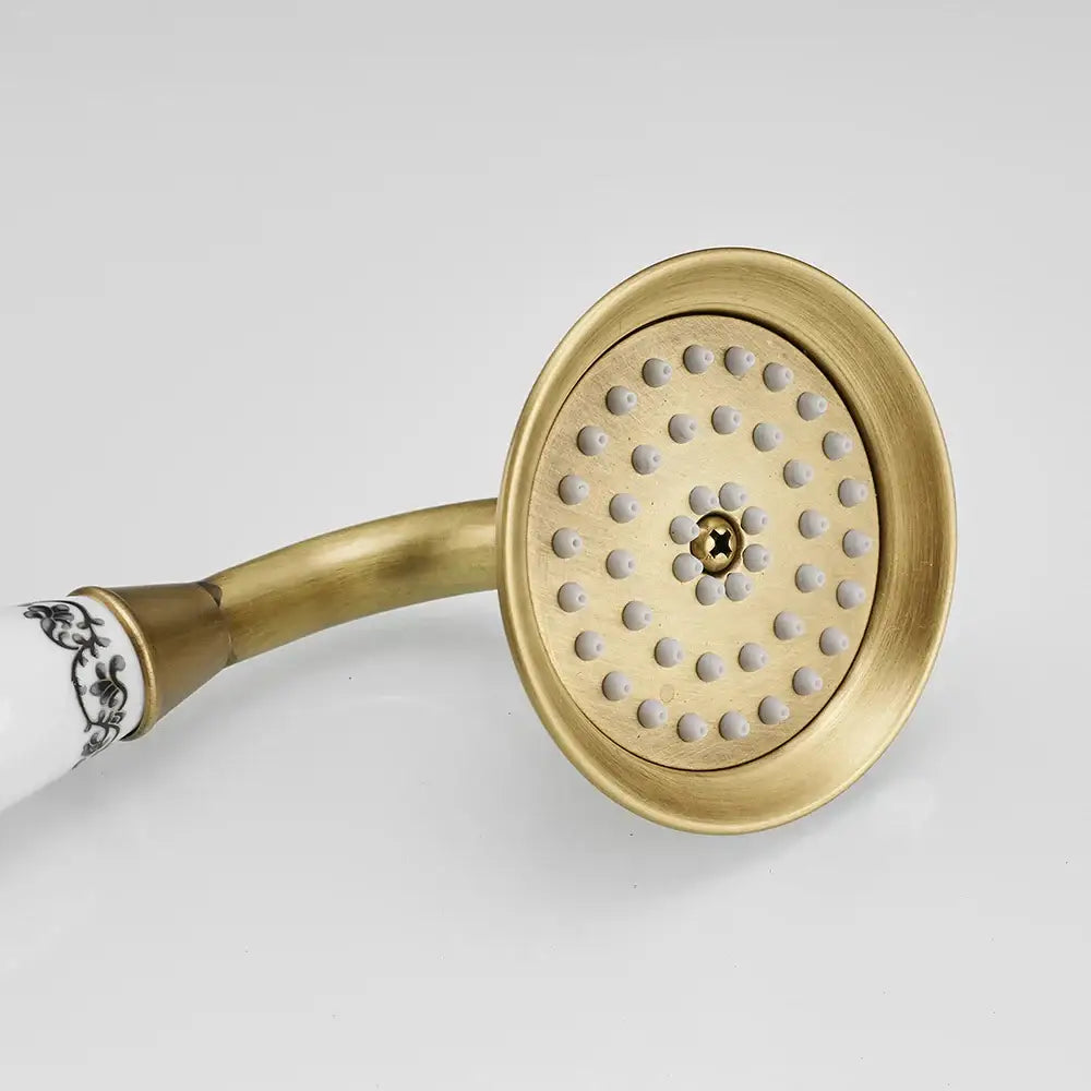 Antique brass and white ceramic hand held shower bathroom faucet