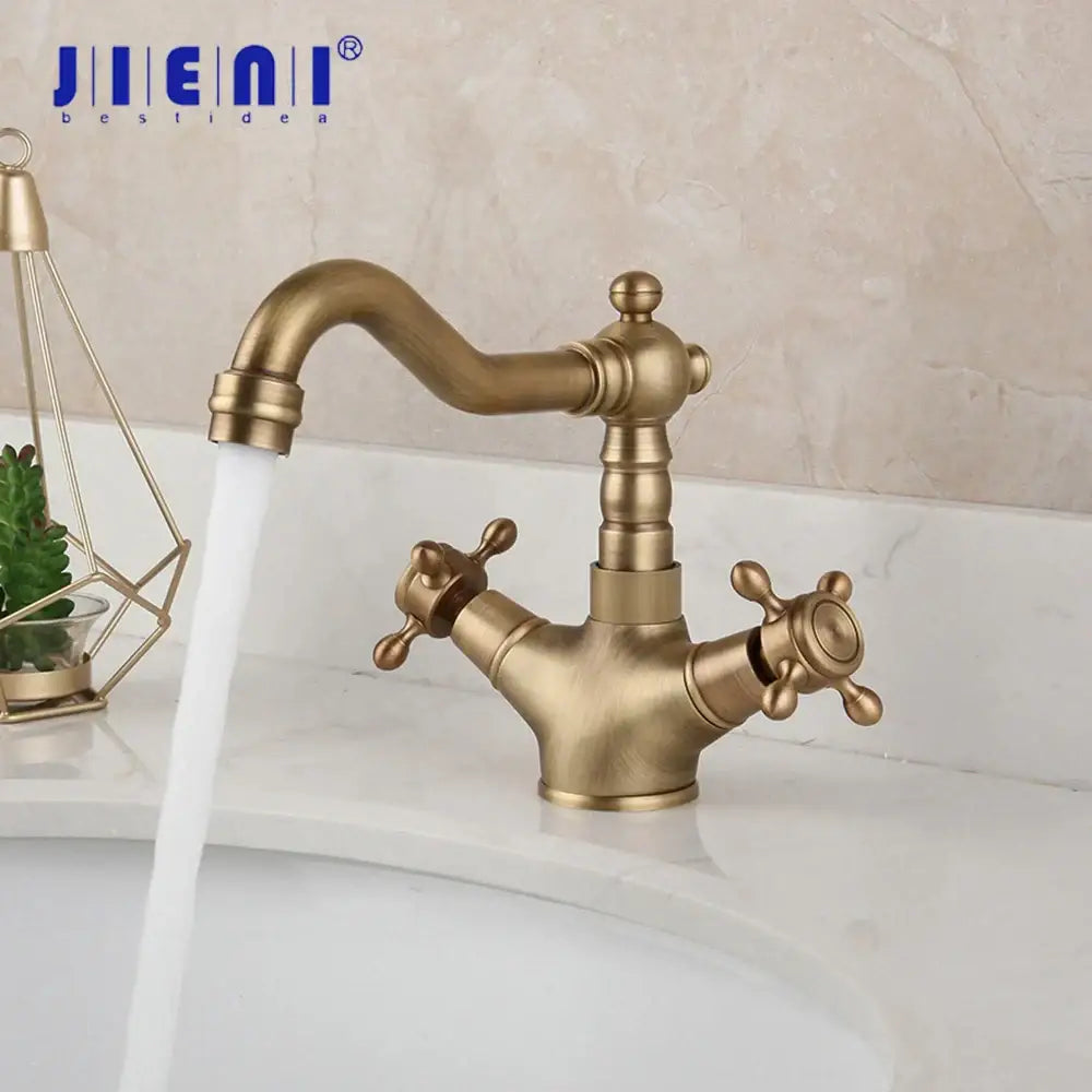Antique brass swivel mixer tap with cross handles for kitchen or bath