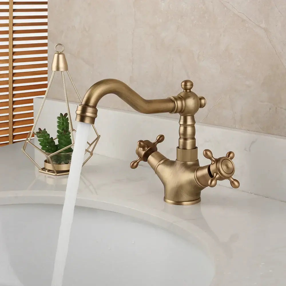 Antique brass swivel mixer tap with cross handles for kitchen or bath