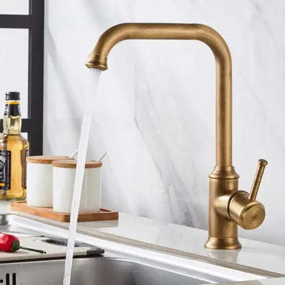 Antique brass kitchen faucet with swivel spout and single lever handle