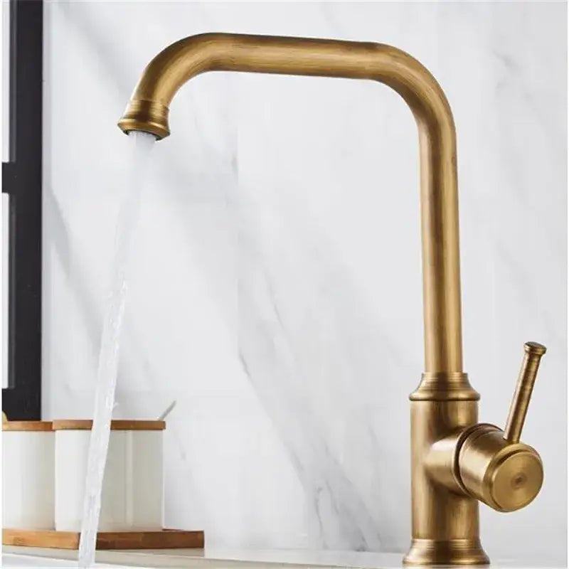 Antique brass kitchen faucet with swivel spout and single lever handle