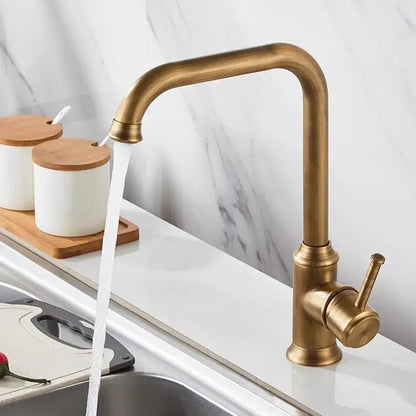 Antique brass kitchen faucet with swivel spout and single lever handle