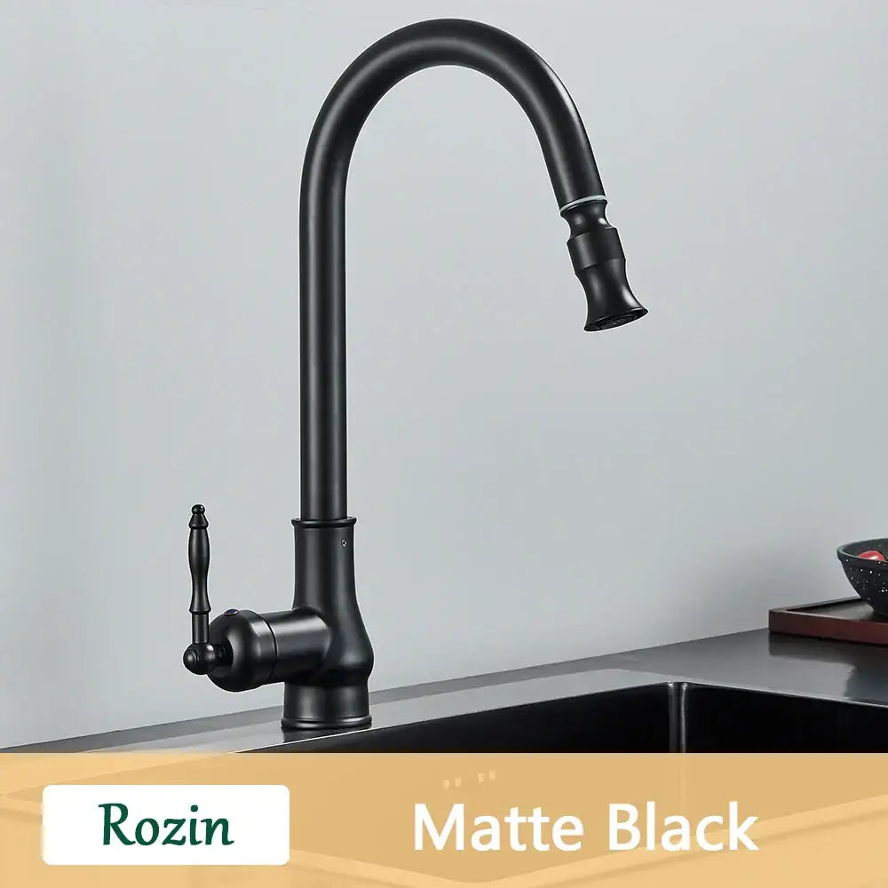 Antique brass kitchen faucet with pull out spout and single lever