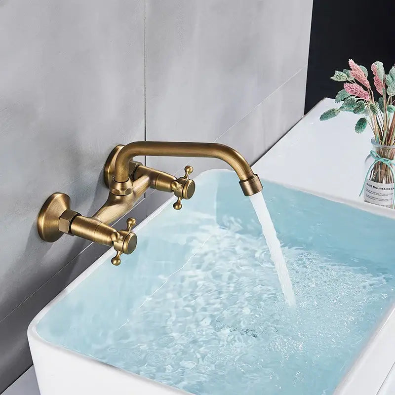 Antique brass wall mounted kitchen faucet with cross handles