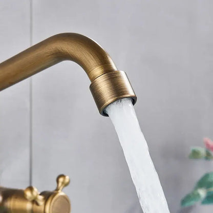 Antique brass wall mounted kitchen faucet with cross handles