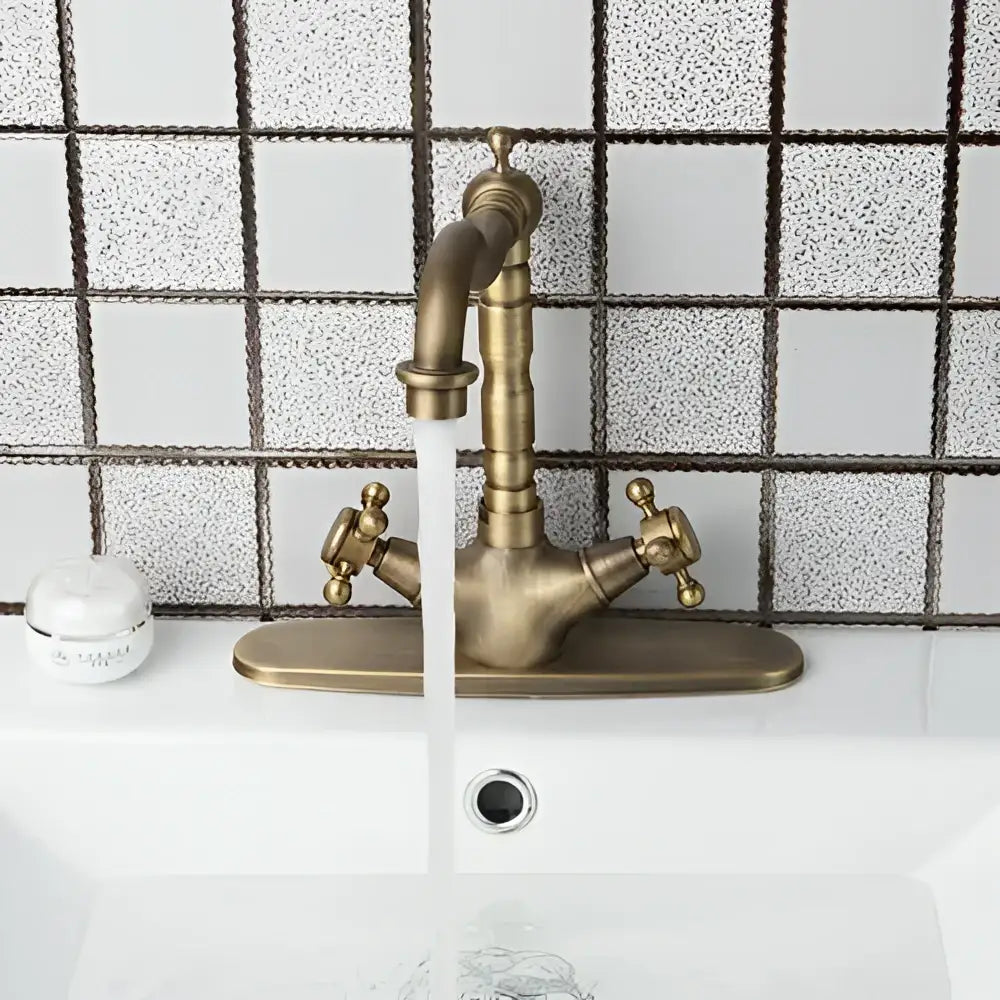 Antique brass farmhouse kitchen tap with double cross handles