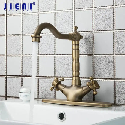 Antique brass farmhouse kitchen tap with double cross handles