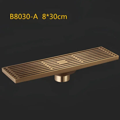 Antique brass linear shower floor drain with carved cover for bathroom
