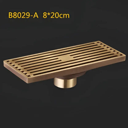 Antique brass linear shower floor drain with carved cover for bathroom
