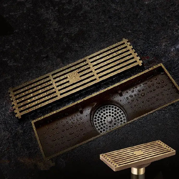 Antique brass linear shower floor drain with carved cover for bathroom