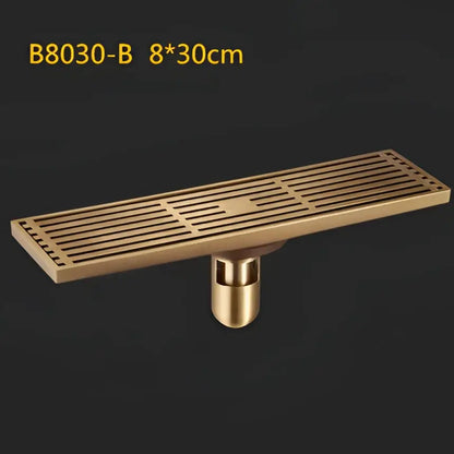 Antique brass linear shower floor drain with carved cover for bathroom