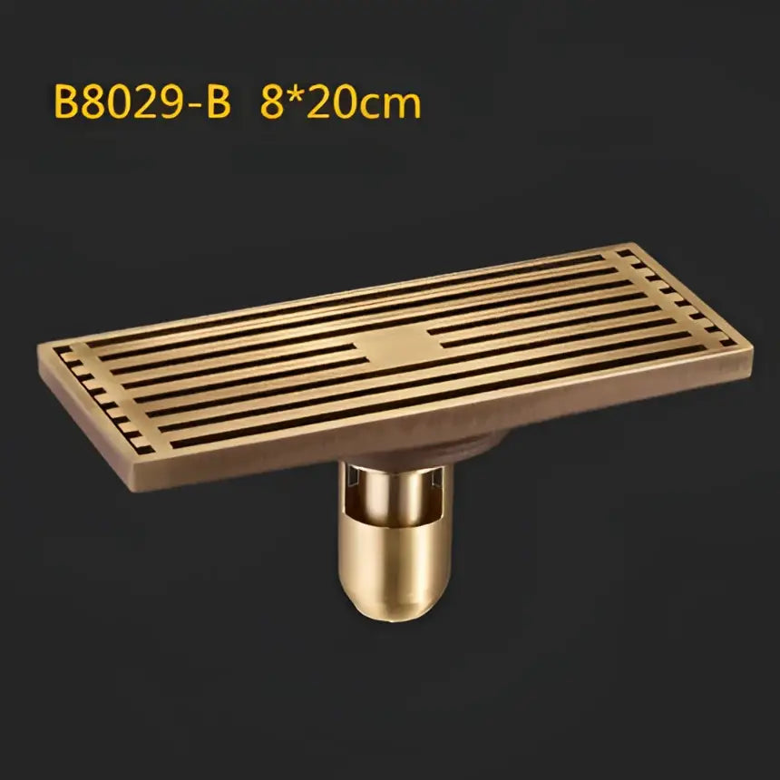 Antique brass linear shower floor drain with carved cover for bathroom