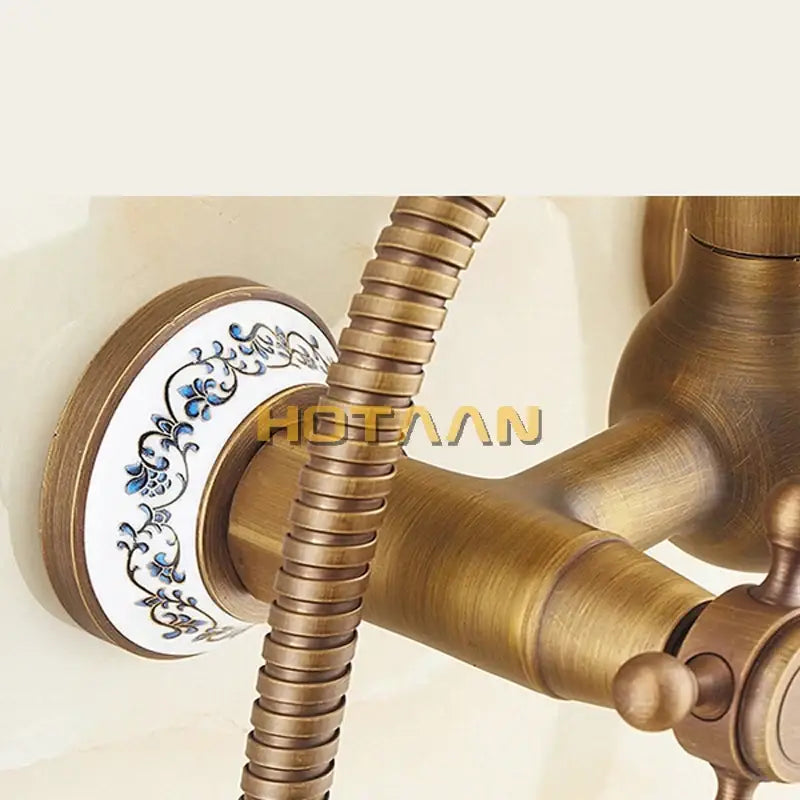 Antique brass rainfall shower faucet set with porcelain knobs bathroom