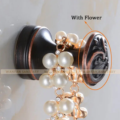 Antique brass robe hook with floral engraving and rope bathroom hook