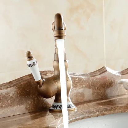 Antique brass floral single handle basin faucet kitchen swivel tap