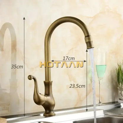 Antique brass ornate kitchen basin mixer tap with curved spout