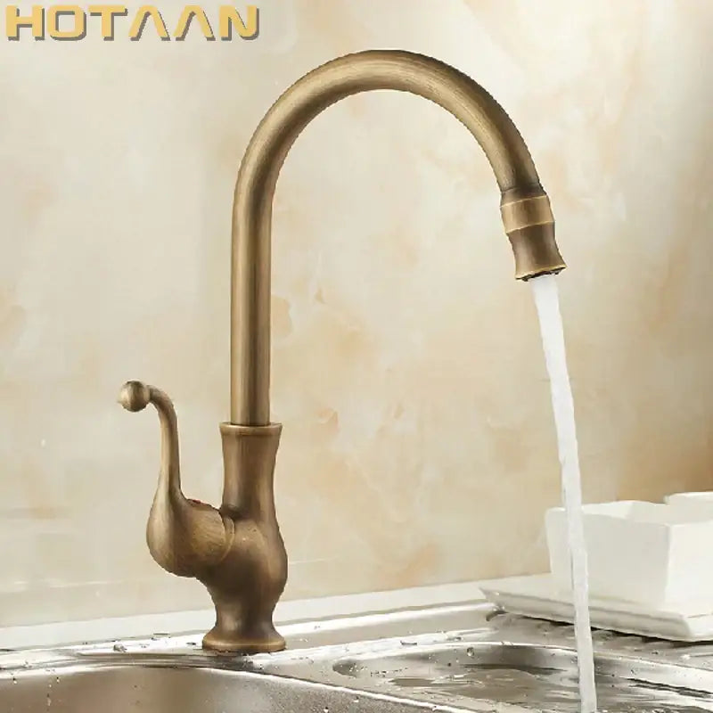 Antique brass ornate kitchen basin mixer tap with curved spout