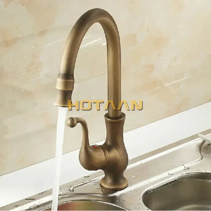 Antique brass ornate kitchen basin mixer tap with curved spout