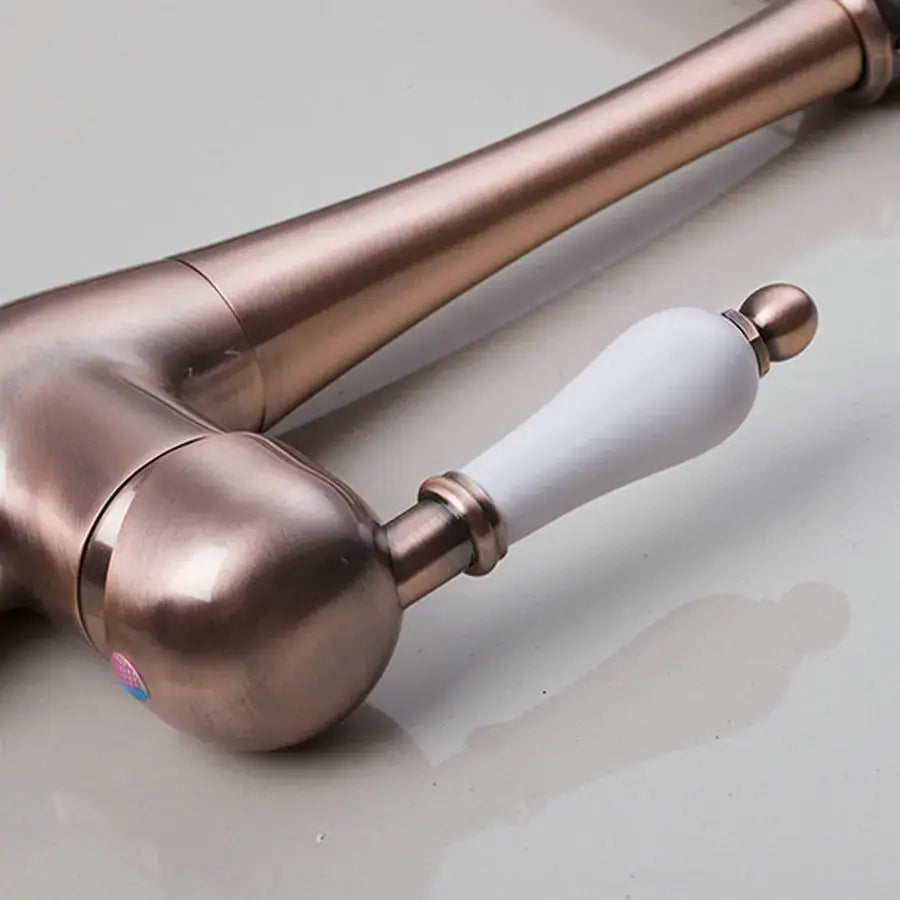 Antique brass kitchen faucet with ceramic handle