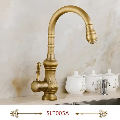 Antique brass swivel spout kitchen faucet with floral ceramic handle