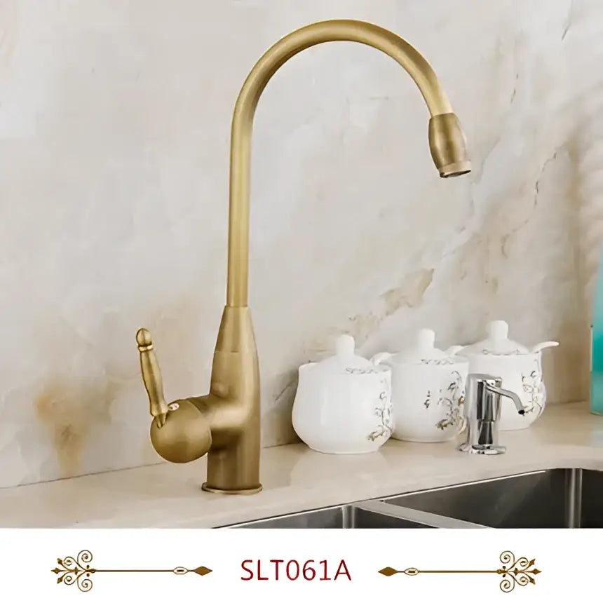 Antique brass swivel spout kitchen faucet with floral ceramic handle