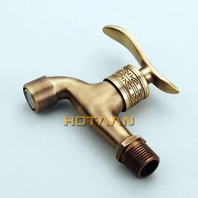 Ornate embossed antique brass wall mount faucet bathroom fixture