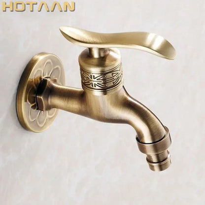 Ornate embossed antique brass wall mount faucet bathroom fixture