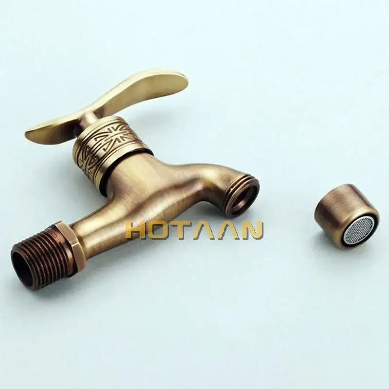 Ornate embossed antique brass wall mount faucet bathroom fixture