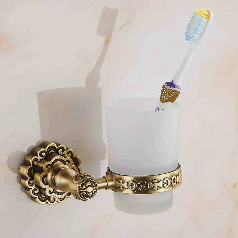 Antique brass wall mounted toothbrush holder with glass cup bathroom