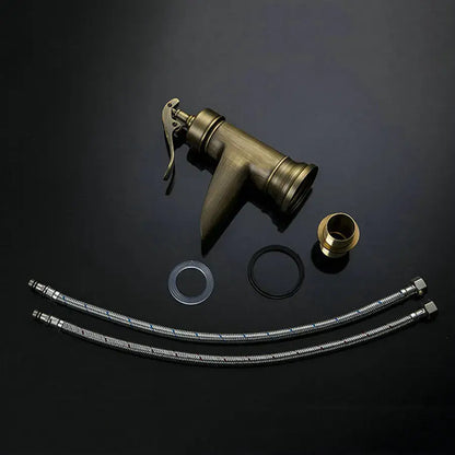 Antique brass waterfall basin faucet with art handle for bathroom