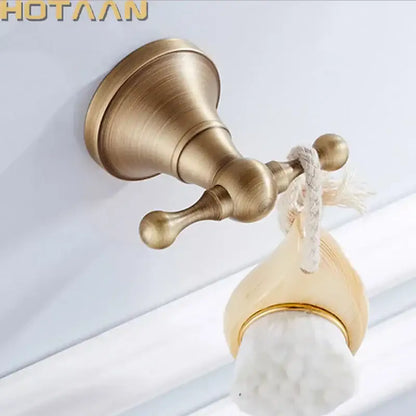 Antique brass wall hooks with teardrop wood and bristles bedroom rack