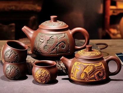 Antique bronze teapot set with dragon motifs for dining room