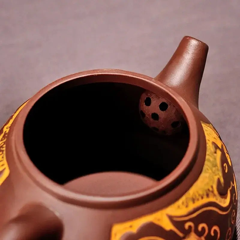 Antique bronze teapot set with dragon motifs for dining room