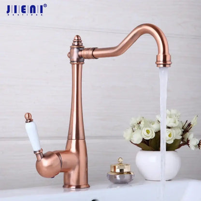 Antique copper and white kitchen basin mixer tap with ceramic handle