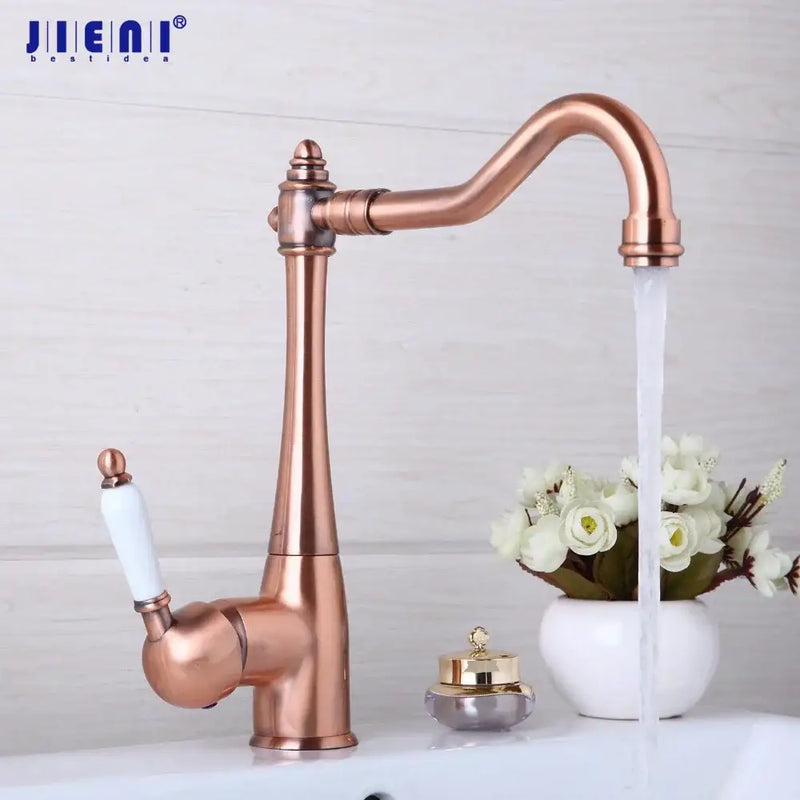 Antique copper and white kitchen basin mixer tap with ceramic handle