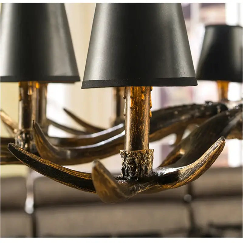Retro golden brown antler resin chandelier with black shades dining room