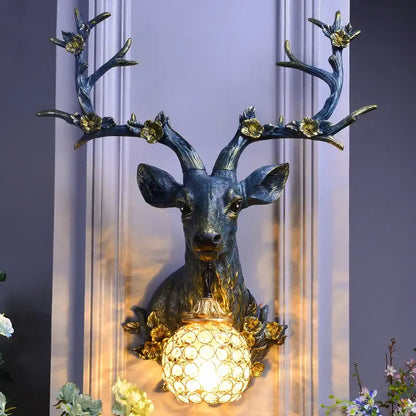 Antique bronze antler wall lamp with crystal globe for living room