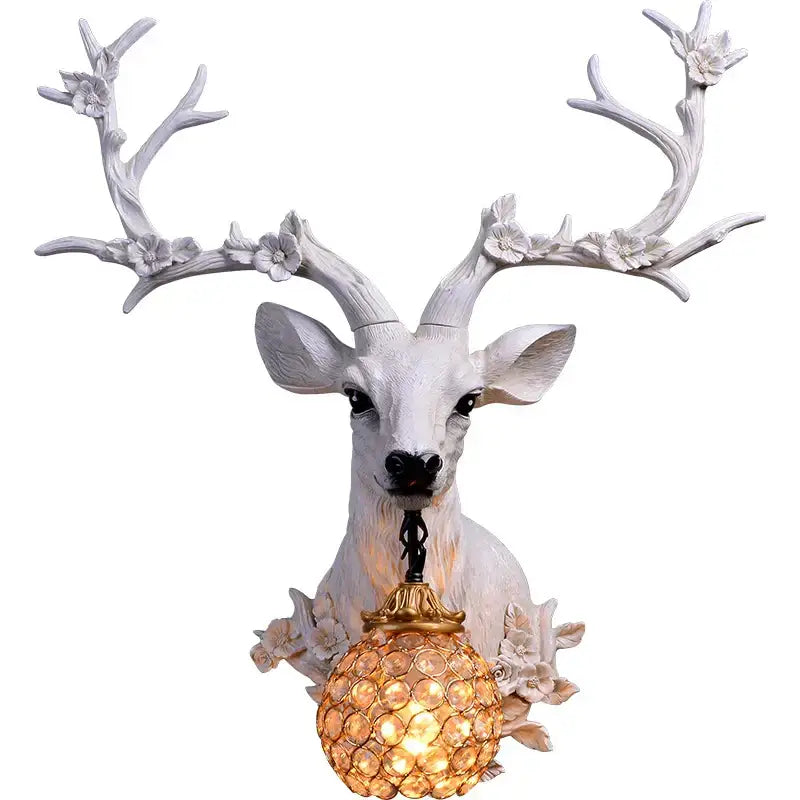 Antique bronze antler wall lamp with crystal globe for living room