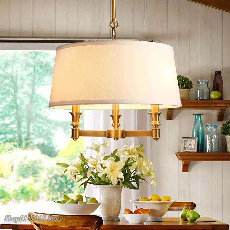 Art deco copper pendant light with fabric shade for dining room
