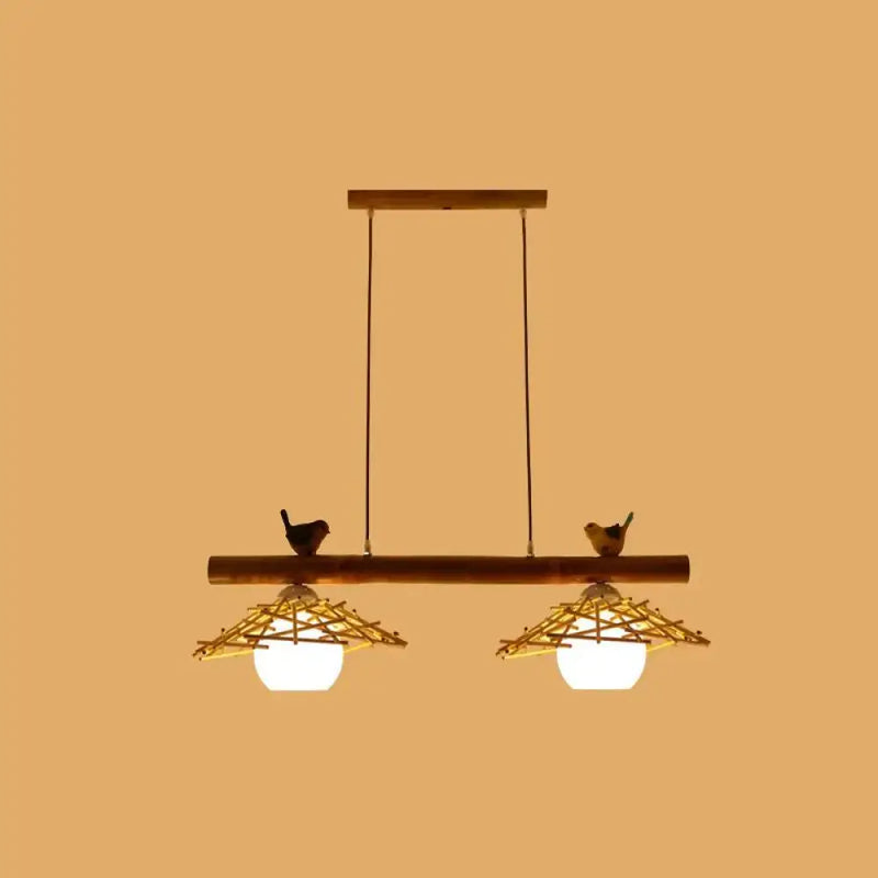 Rustic bamboo pendant with birds and white glass globe dining room