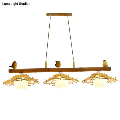 Rustic bamboo pendant with birds and white glass globe dining room