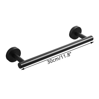 Modern brass bathroom hardware set with cylindrical towel rack
