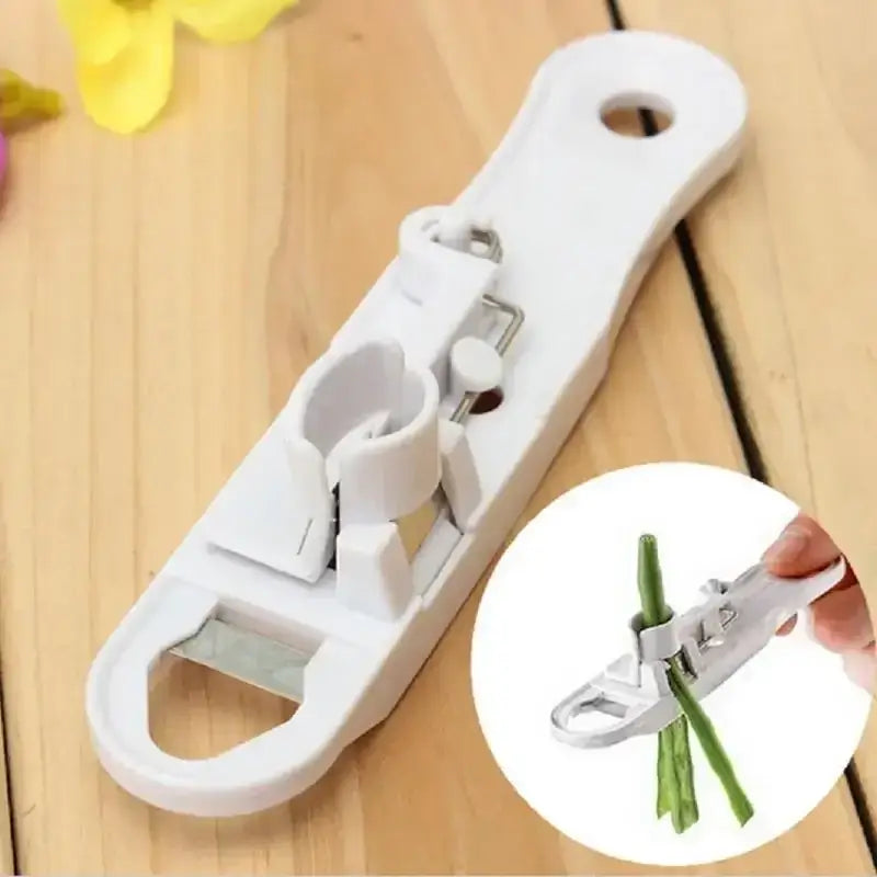 White plastic bean slicer cutter peeler for kitchen green beans