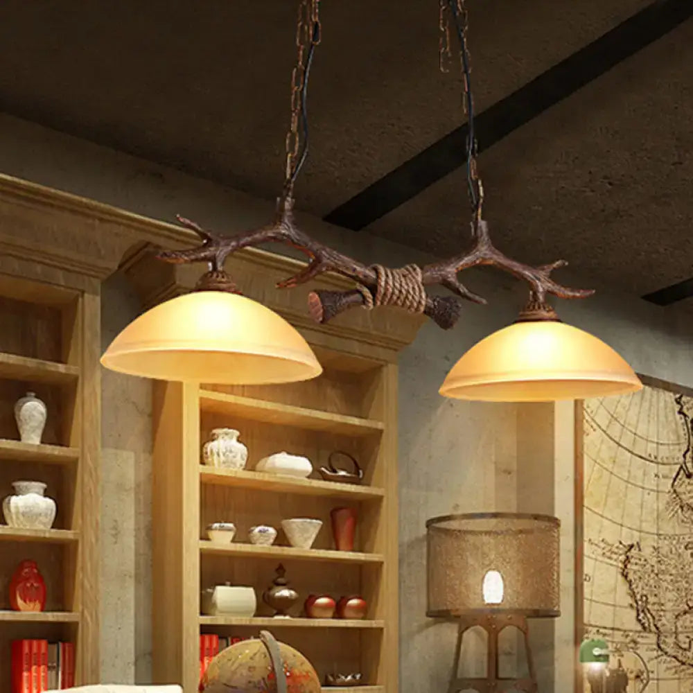 Rustic antler decor dark coffee island light beige glass dining room